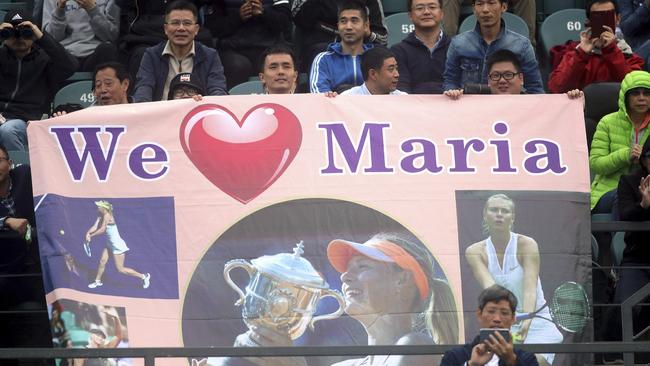 Chinese fans show their support for Sharapova at the Shenzhen Open.