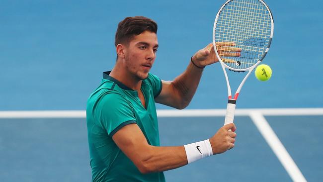 BRISBANE, AUSTRALIA — JANUARY 07: Thanasi Kokkinakis of Australia plays a backhand during his doubles match partnered with Jordan Thompson against Daniel Nestor and Edouard Roger-Vasselin during day seven of the 2017 Brisbane International at Pat Rafter Arena on January 7, 2017 in Brisbane, Australia. (Photo by Chris Hyde/Getty Images)