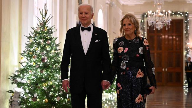 US President Joe Biden and First Lady Jill Biden arrive at a reception for the Kennedy Center Honorees in the East Room of the White House in Washington, DC, on December 4, 2022. (Photo by SAUL LOEB / AFP)