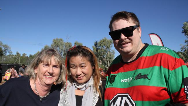 Chris Hines, Trang Tran, and Karen Reeves at Traeger Park, Alice Springs, for the Demons Saints game on June 1, 2025. Picture: Gera Kazakov