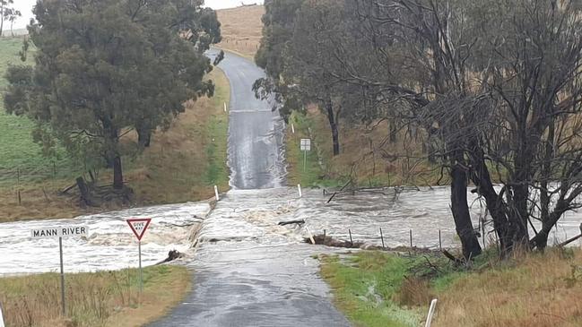 A flooded bridge on Mt Mitchell Rd, NSW, which is closed due to flooding. NSW SES conducted 49 flood rescues &amp; received 543 requests across NSW, mostly in western parts. Warnings issued for low lying areas, and roads are flooding in New England/surrounds. Picture: NSW SES