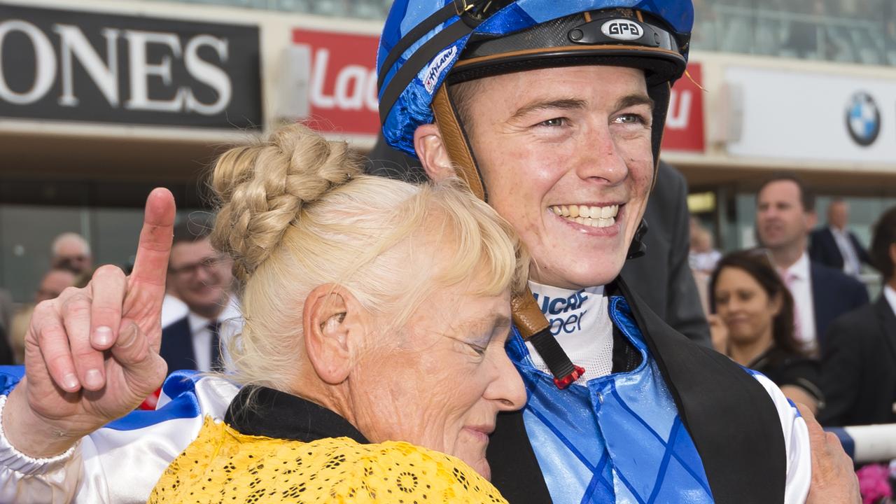 Cranbourne trainer Udyta Clarke with jockey Patrick Moloney after one of Rich Charm’s wins at Caulfield. Picture: Getty Images