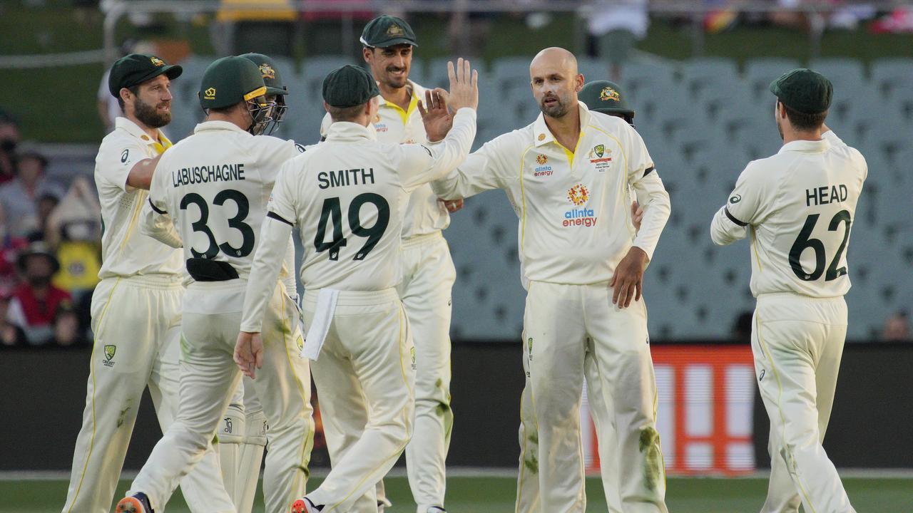 Nathan Lyon of Australia celebrates with his teammates. (Photo by Daniel Kalisz/Getty Images)