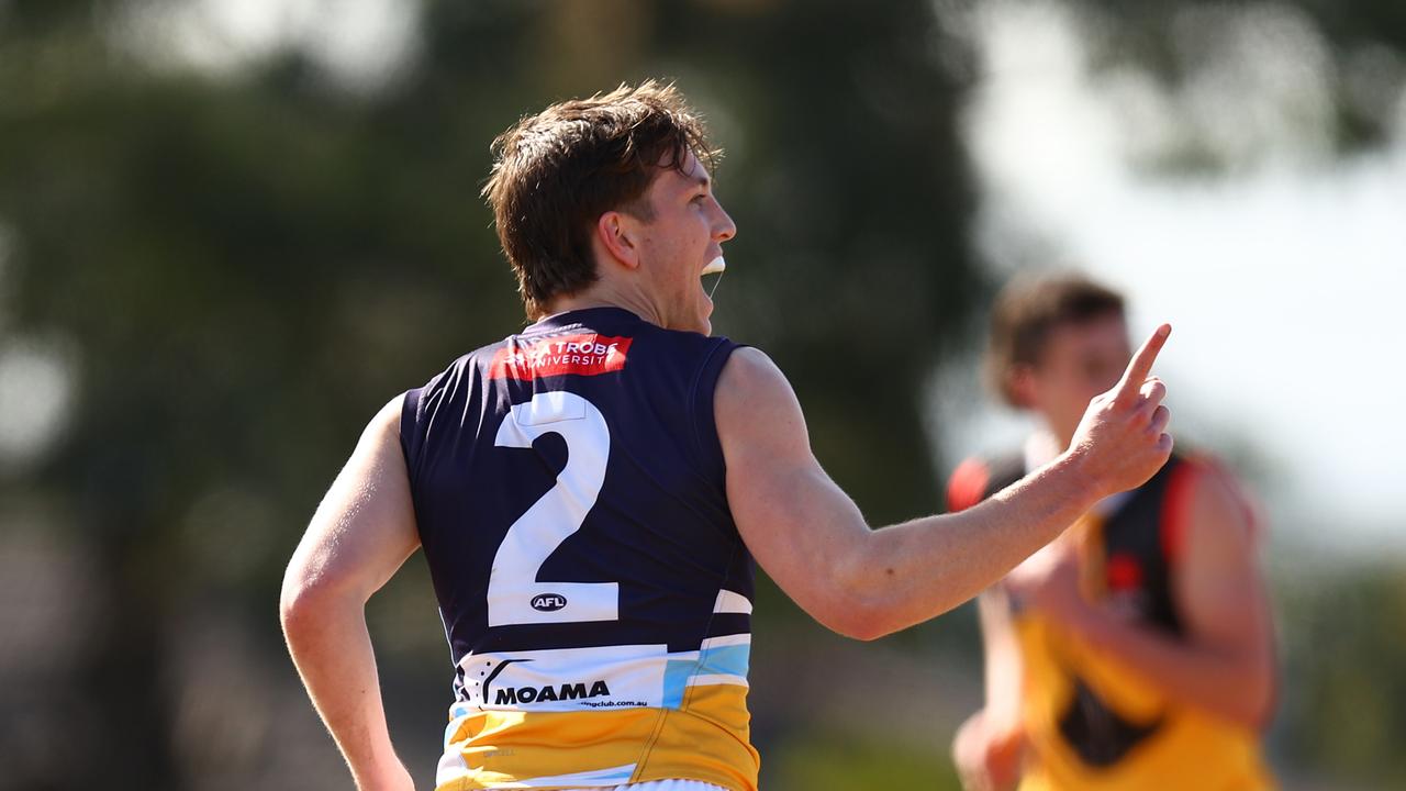 Harvey Gallagher celebrates a goal for the Pioneers. Picture: Graham Denholm/AFL Photos via Getty Images