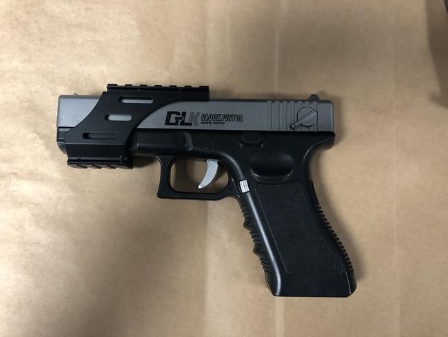 A Glock-18 replica 'Gel Blaster' pistol seized from a man by Northern Beaches Police after receiving a triple zero call from a member of the public reporting seeing a man with a gun at a popular beach lookout. Picture: NSW Police