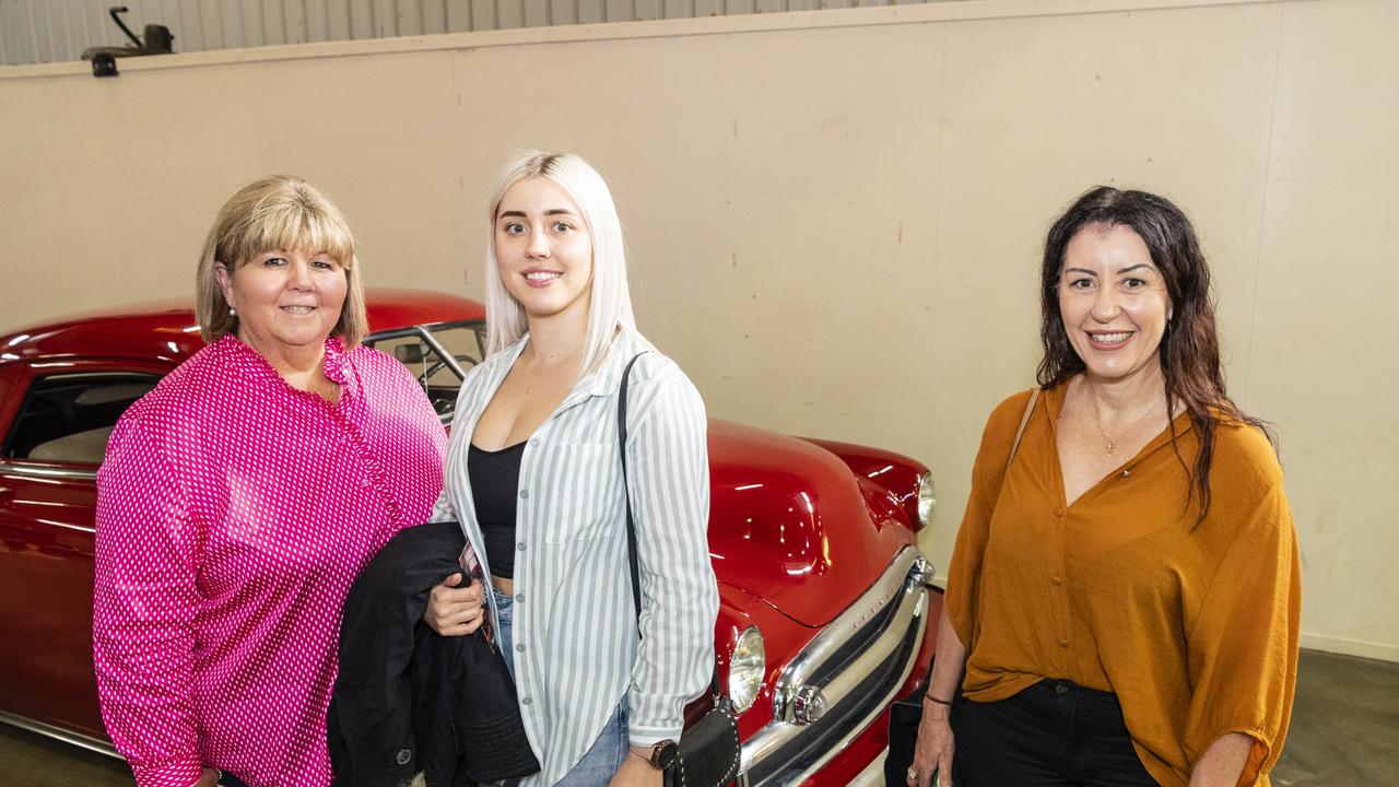 Checking out the cars on show are (from left) Gail Ellis, Charlotte Donald and Amanda Pringle at Meatstock at Toowoomba Showgrounds, Friday, April 8, 2022. Picture: Kevin Farmer