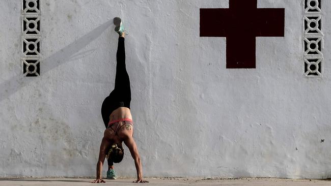 A woman works out in Valencia after Spaniards were allowed outdoors for the first time since March 14. Picture: AFP