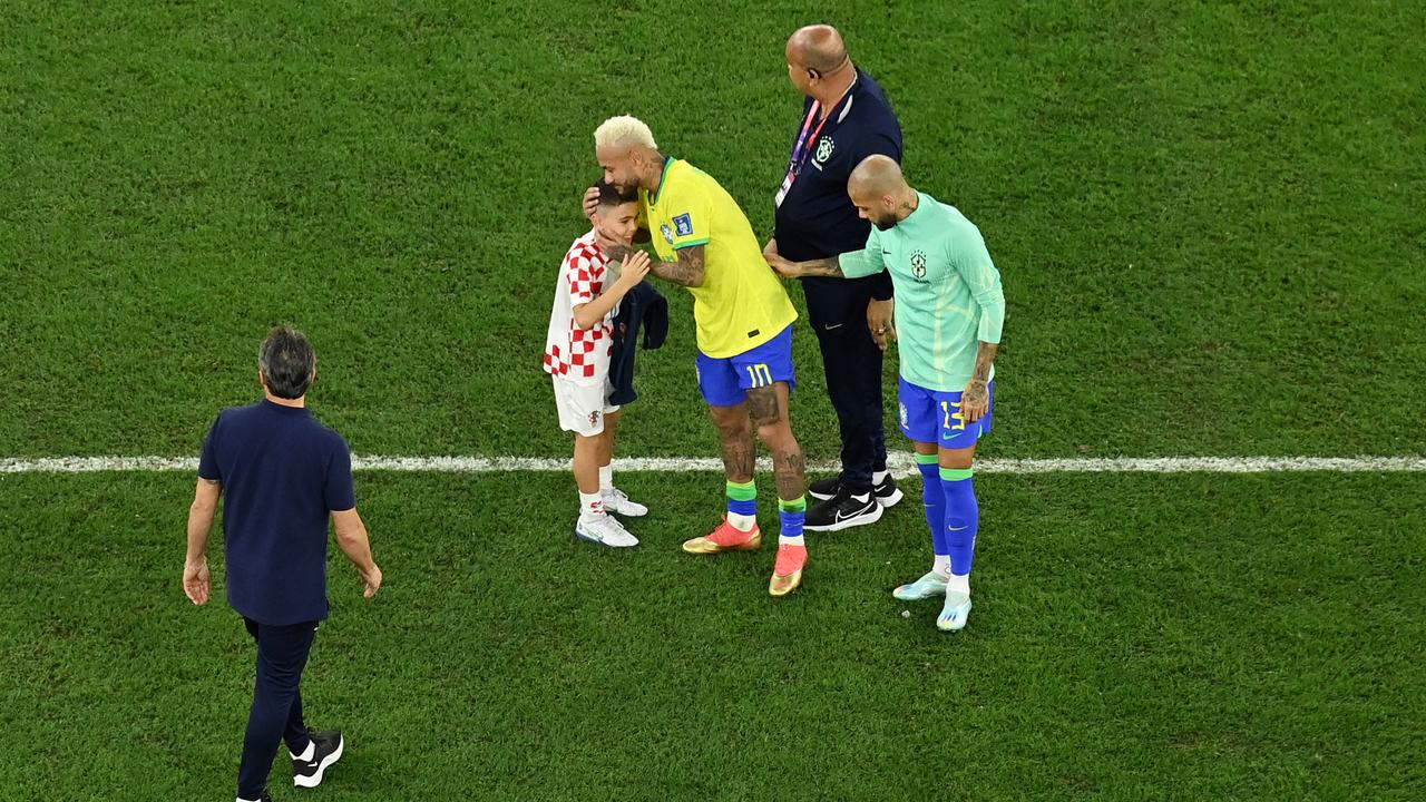 Neymar and Dani Alves of Brazil look dejected after their sides' elimination from the tournament. Picture: David Ramos - FIFA