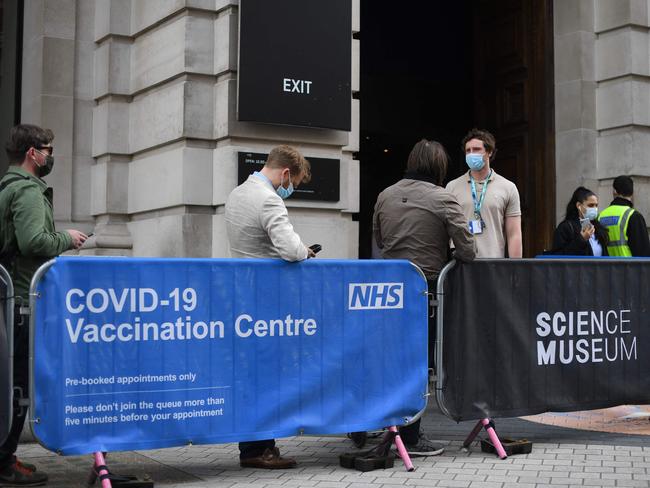 Members of the public queue to receive a Covid-19 vaccine at a temporary vaccination centre at the Science Museum in London. Picture: AFP