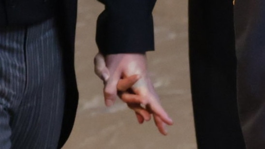 The Sussexes hold each other tight. (Photo by Ian Vogler – WPA Pool/Getty Images)