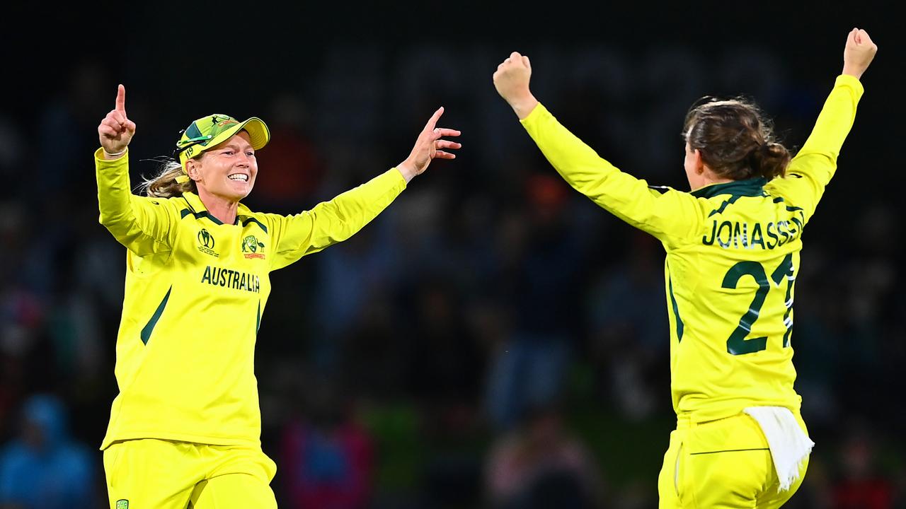 Australia captain Meg Lanning celebrates with teammate Jess Jonassen after defeating England at Hagley Oval. Photo: Getty Images