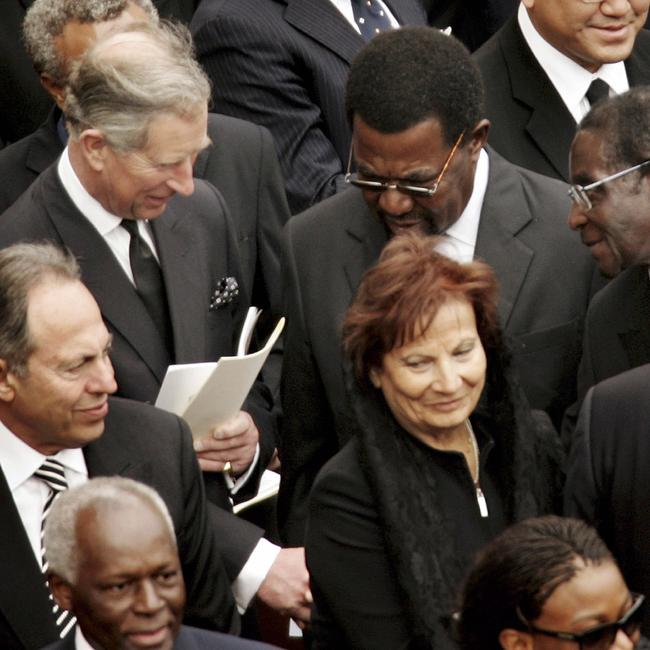 Prince Charles shakes hands with Zimbabwe’s President Robert Mugabe during Pope John Paul II’s funeral at St Peter’s Square in 2005. Picture: Getty Images