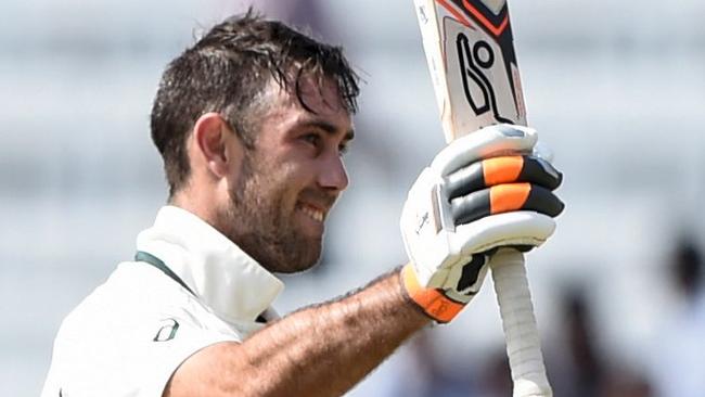 Glenn Maxwell (R) celebrates his maiden Test century in the third Test against India.