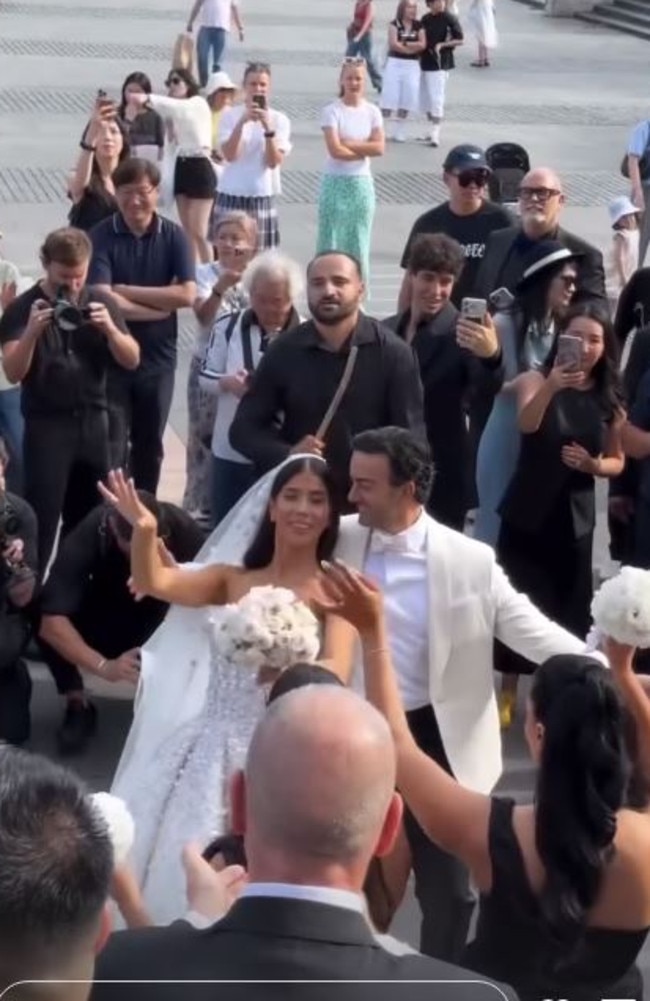 After a traditional ceremony inside St Mary’s Cathedral, the couple celebrate with their family and friends outside the church. Picture: Instagram