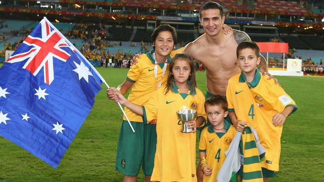 Tim Cahill with his kids.