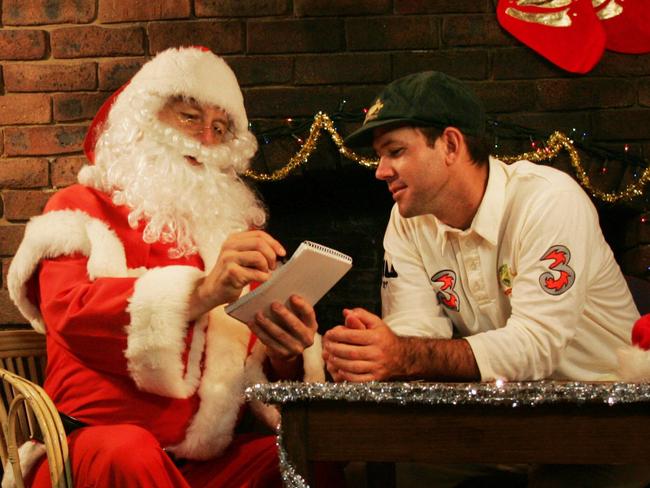 Australian captain Ricky Ponting with Santa Claus reading his Christmas list for Boxing Day test match in Melbourne.