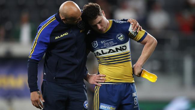 Blake Ferguson consoles Mitchell Moses after their semi-final loss to South Sydney in the second week of the finals. Picture: Brett Costello