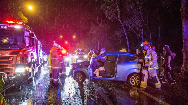 Night ride along with QAS (Queensland Ambulance Service). 19:30: An accident scene involving one vehicle  which lost control and crashed into a tree along Smith Street Motorway, Gaven. Picture: Jerad Williams