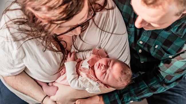 Jade Manson and Tyson Brandt with their daughter, Pippa, who was born in June. Picture: Third Eye Imagery