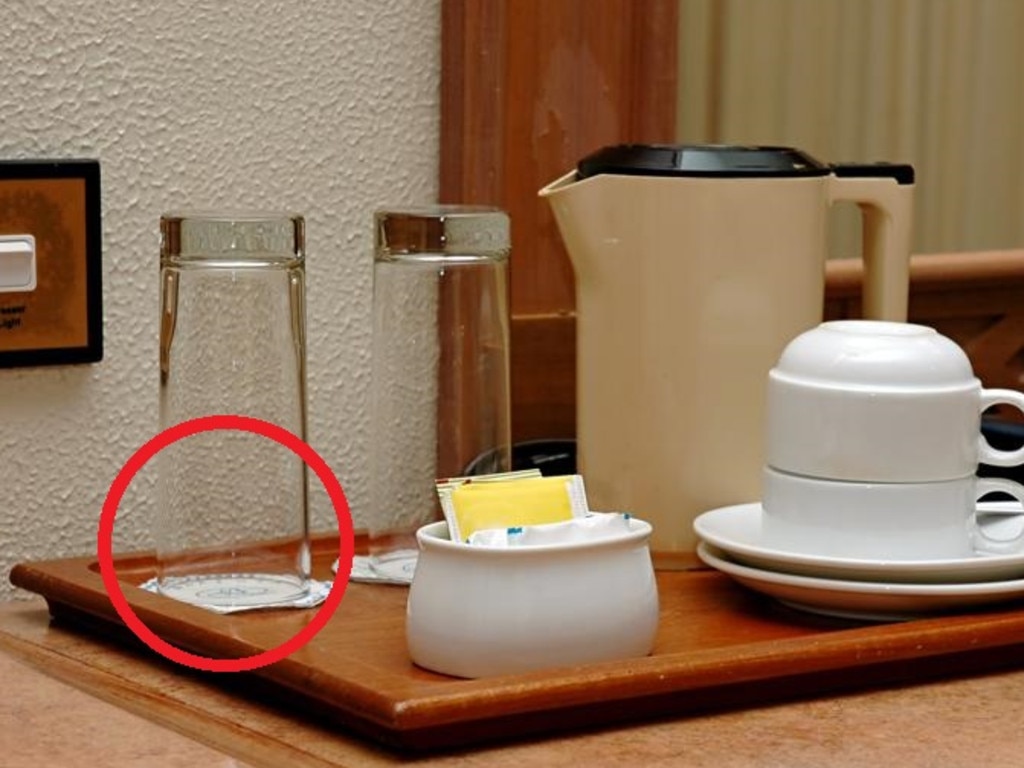You might want to think twice before drinking from a hotel room glass.