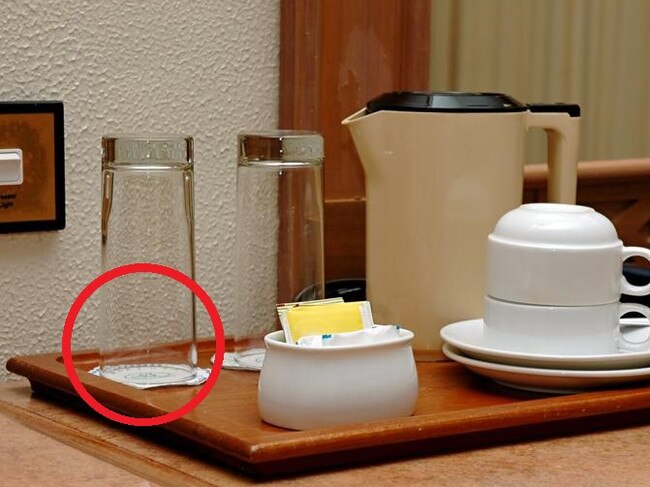 You might want to think twice before drinking from a hotel room glass.