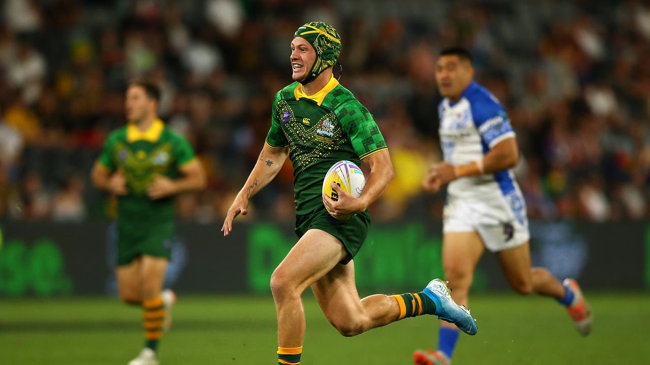 SYDNEY, AUSTRALIA - OCTOBER 19: Kalyn Ponga of Australia makes a break to score a try during the Semi Final Rugby League World Cup 9s match between Australia and Samoa at Bankwest Stadium on October 19, 2019 in Sydney, Australia. (Photo by Matt Blyth/Getty Images)