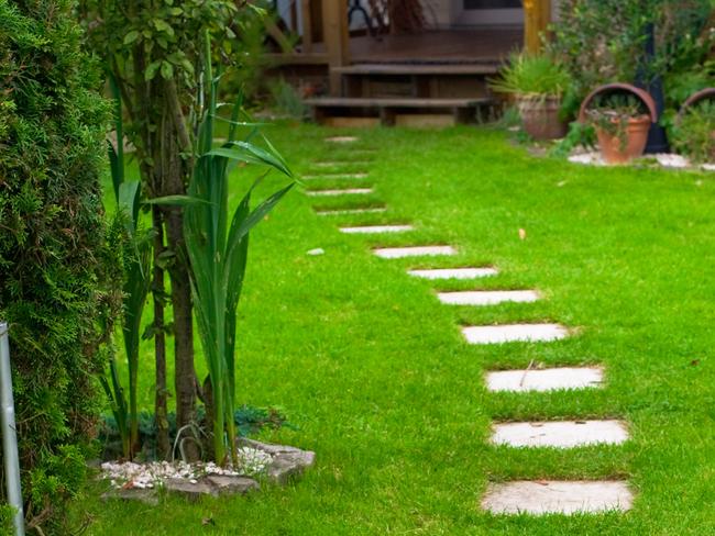 Stepping stones are an easy way to use leftover pavers.