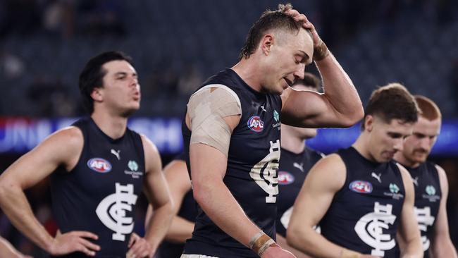 MELBOURNE, AUSTRALIA - JULY 13:  A disappointed Patrick Cripps of the Blues walks from the ground after the round 18 AFL match between Western Bulldogs and Carlton Blues at Marvel Stadium, on July 13, 2024, in Melbourne, Australia. (Photo by Darrian Traynor/AFL Photos/via Getty Images)