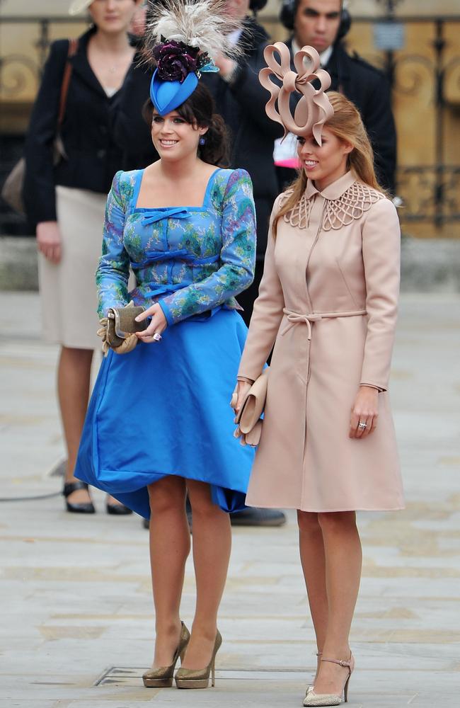 Beatrice, pictured with her younger sister Eugenie (left) previously wore the same shoes to the wedding of her cousin, Prince William, to Kate Middleton in 2011. Picture: Pascal Le Segretain/Getty