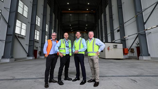 Managing director of CSF Industries Sean Adams, Queensland Deputy Premier Cameron Dick, Norship chief executive Olav Groot and Cairns MP Michael Healy in the newly opened cavernous facility equipped with two gantry cranes and a complete ventilation system. Picture: Brendan Radke