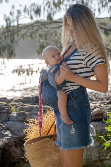 baby wearing dungarees