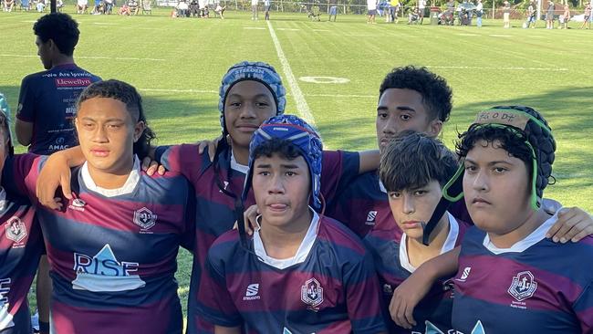 The victorious Ipswich State High Year 8 side pose for the camera after a grand performance.