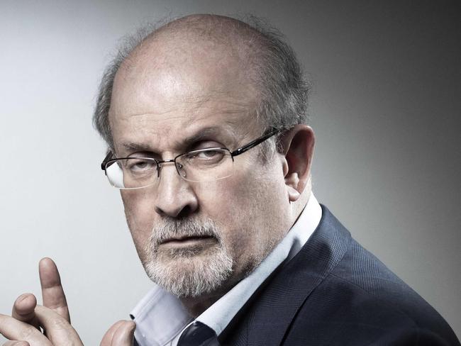 (FILES) In this file photo taken on September 10, 2018, British novelist and essayist Salman Rushdie poses during a photo session in Paris. - Salman Rushdie, who spent years in hiding after an Iranian fatwa ordered his killing, was on a ventilator and could lose an eye following a stabbing attack at a literary event in New York state on August 11, 2022. (Photo by JOEL SAGET / AFP)