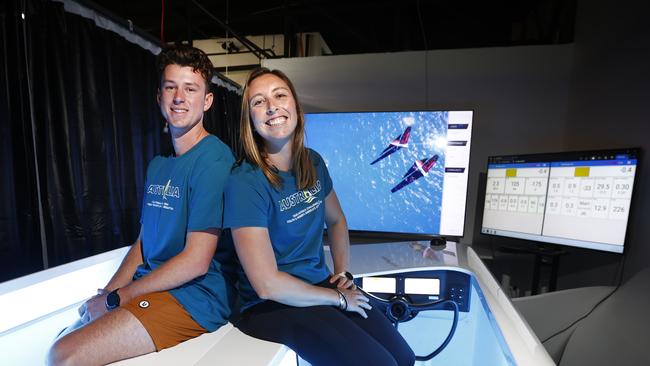 Australian sailors Jack Ferguson and Olivia Price in the sailing simulator. Picture: Richard Dobson