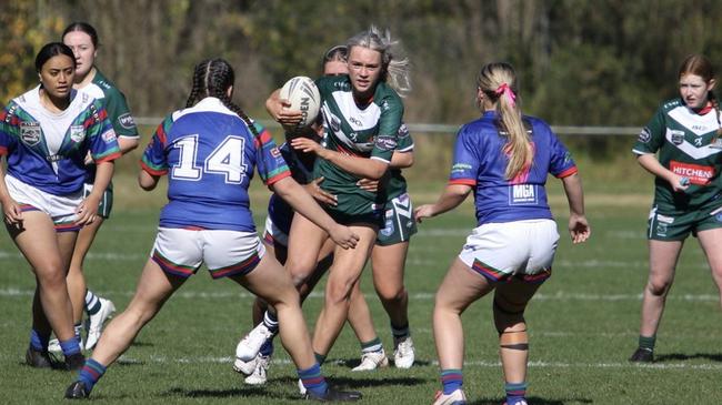 Speedy St Marys winger Halle Savage caught in traffic. Picture: St Marys