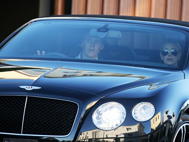 Curtis and Jacenko leave their home today. Picture: John Grainger