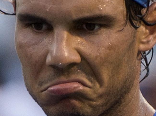 Rafael Nadal, of Spain, challenges a call during his match against Mikhail Youzhny, of Russia, at the Rogers Cup tennis tournament Thursday. Aug. 13, 2015, in Montreal. (Paul Chiasson/The Canadian Press via AP)