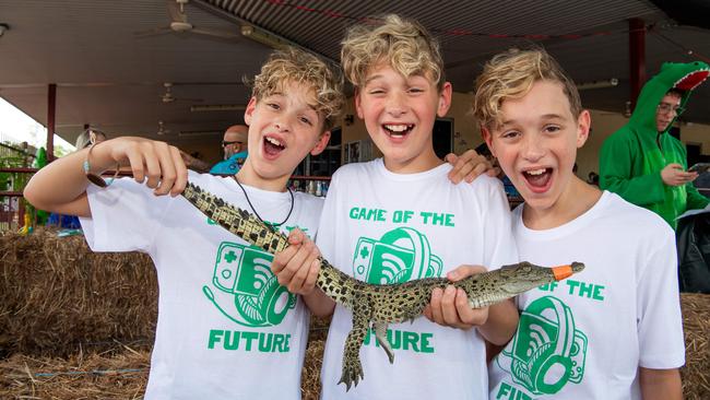 Clay Childs, Kobi Childs and Nate Childs at the Berry Springs Tavern croc race. Picture: Pema Tamang Pakhrin