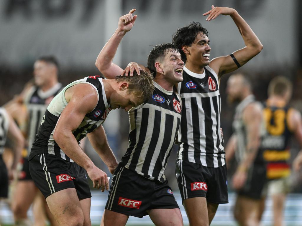 Dan Houston, Zak Butters and Jase Burgoyne of the Power celebrate the final siren of the Showdown. Picture: Mark Brake/Getty Images.