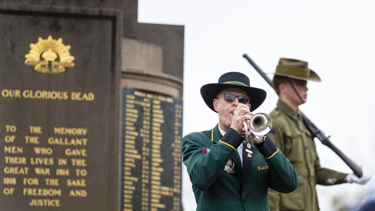 Alan Skerman of the Toowoomba Municipal Band plays Rouse during the Citizens Commemoration Service at the Mothers' Memorial on Anzac Day, Monday, April 25, 2022. Picture: Kevin Farmer