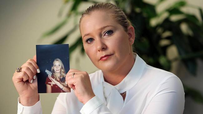 Virginia Roberts Giuffre, with a photo of herself as a teen, when she says she was abused by Jeffrey Epstein, among others. Picture: Emily Michot/Miami Herald/Tribune News Service via Getty Images