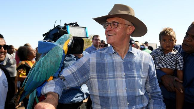 Prime Minister Malcolm Turnbull meets a local during his two-day visit to Tennant Creek.  Picture: AAP/Dan Himbrechts