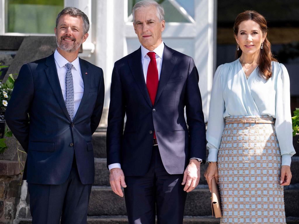 Norway's Prime Minister Jonas Gahr Store (C) stands with King Frederik X of Denmark (L) and Queen Mary of Denmark (R) outside the commander's residence at Akershus fortress. Picture: AFP