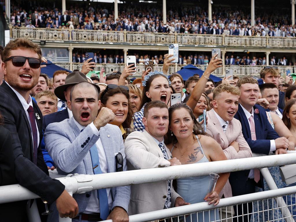 Craig Williams rides Bella Nipotina to win the TAB Everest as punters go wild on the finishing line. Picture: Sam Ruttyn