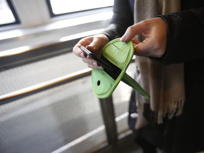 An example of how a mobile is placed inside the lockable Yondr pouch. Picture: Wall Street Journal