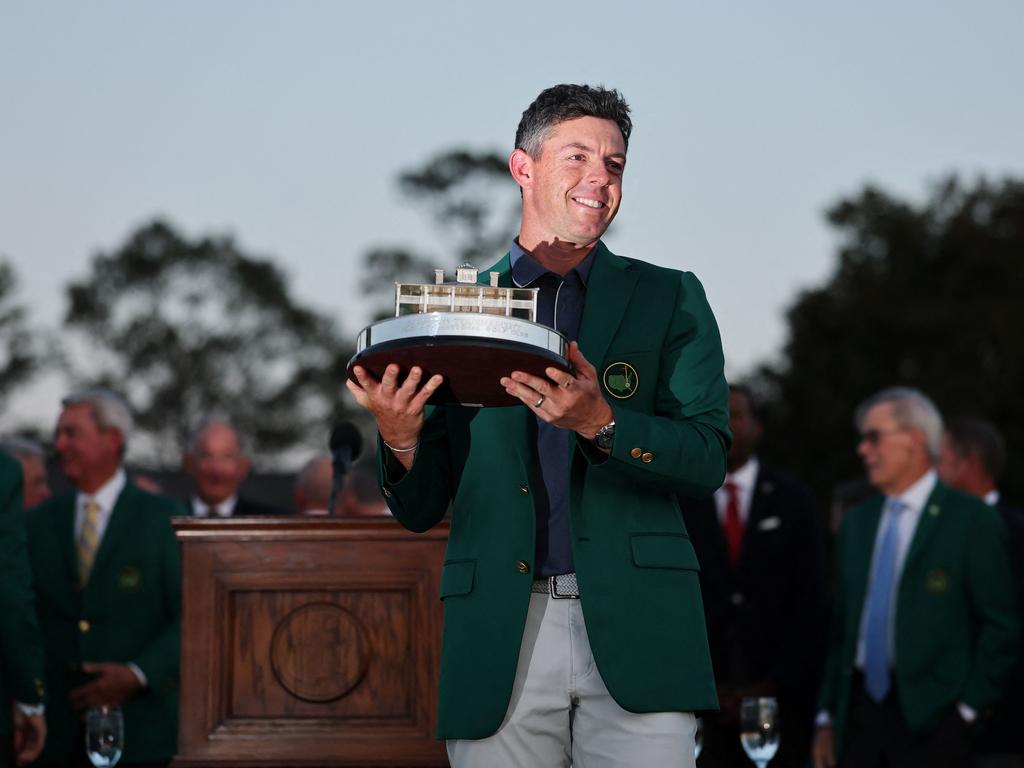 Rory McIlroy of Northern Ireland poses with the Masters trophy during the Green Jacket Ceremony after winning the 2025 Masters. Picture: AFP