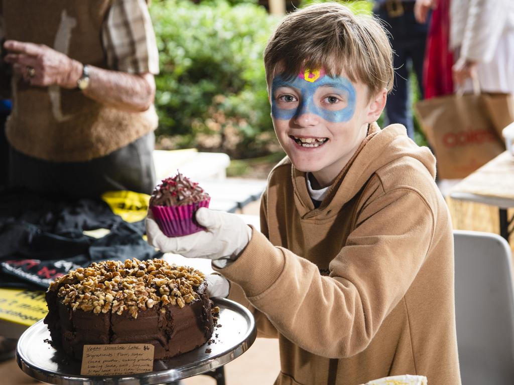 Blayde Coutts selling vegan baked goods at World Environment Day Toowoomba celebrations at wet weather venue Rangeville State School, Sunday, June 4, 2023. Picture: Kevin Farmer