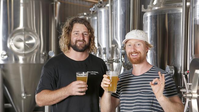 Red Earth Brewing's head brewer Zeke Hower and brewery manager Ritchie Foreman sample some of the Red earth Rising Sun pale ale which will be among the local brews available at a neighbourhood opening at the Cudgen site next Saturday.