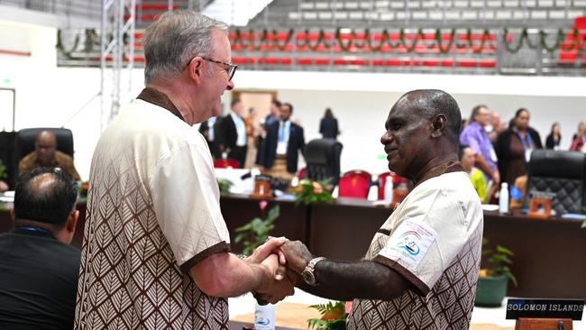 Anthony Albanese greets the Prime Minister of Solomon Islands Jeremiah Manele at the 53rd Pacific Islands Forum leaders’ meeting in Nuku'alofa, Tonga, on Wednesday. Picture: Lukas Coch/AAP