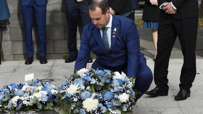 Todd Robinson lays a wreath at the Police Memorial on St Kilda Road. Picture: NCA NewsWire/Andrew Henshaw